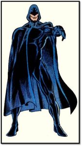 Description: Shroud wears a dark black and blue superhero suit and long cape with a fit physique. The only skin visible is his nose and mouth, and he has light skin. He stands in a powerful stance, one arm reaching out and pointing forward.