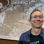 selfie of me with my slide behind me of a page from Nests