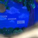 a look through the right eye into the box with a landscape and light blue light